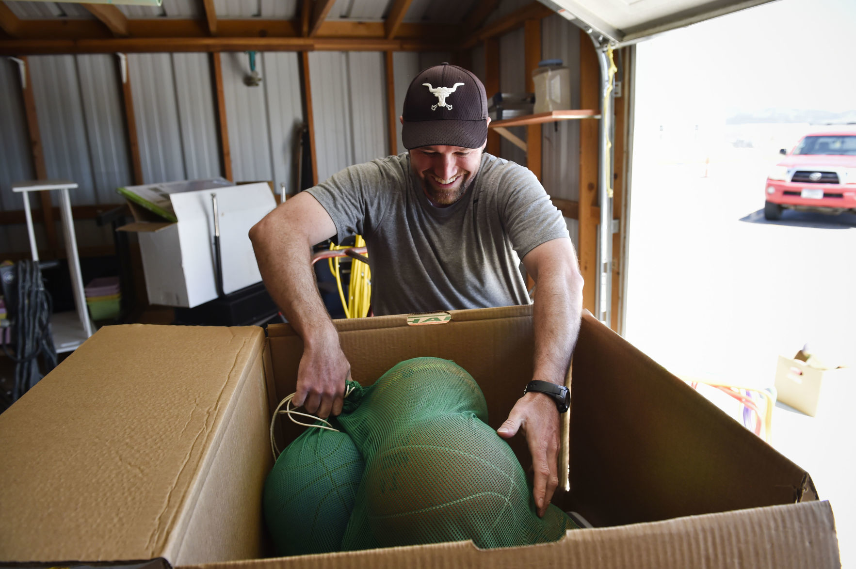 Mike Alberts packs gym equipment